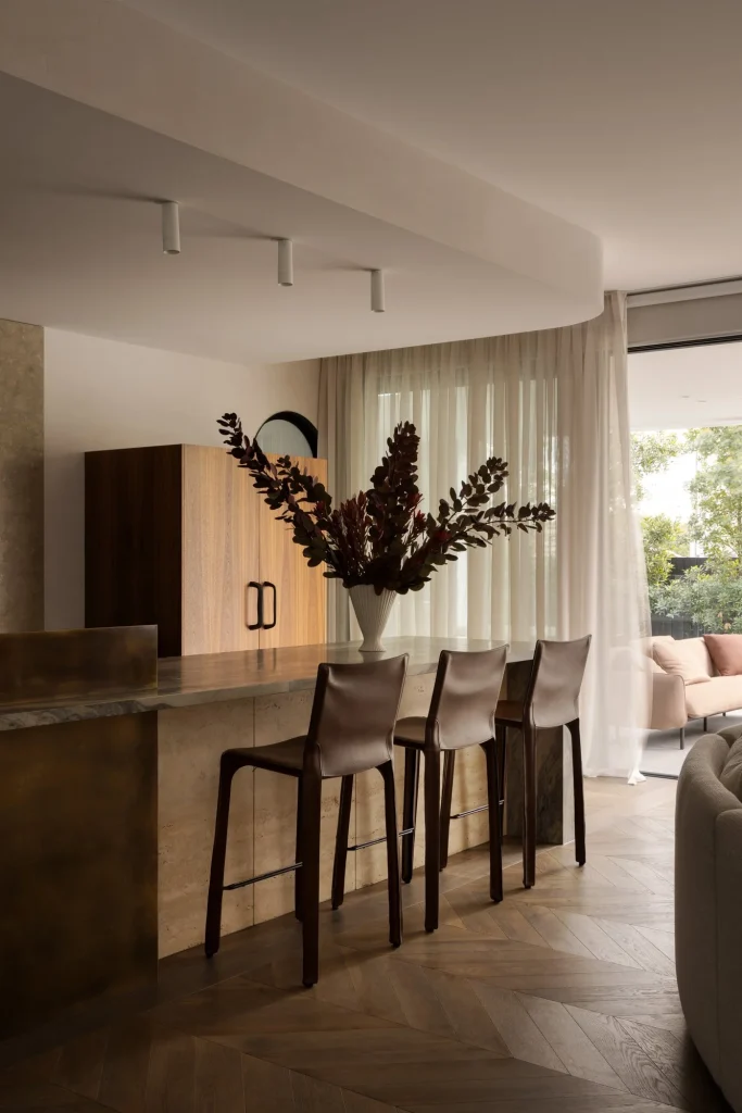 Elegant dining area with herringbone flooring